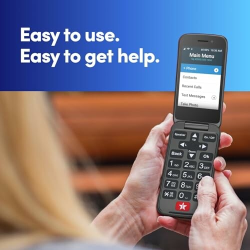 Person using a senior-friendly phone with large buttons.