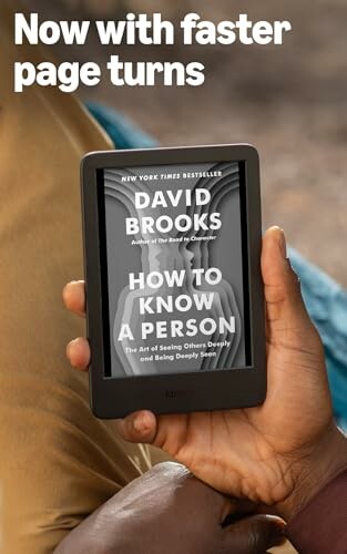 A person holding an eBook reader displaying a book cover, showcasing the Kindle's design and reading capability.