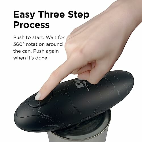 Hand using an electric can opener with easy three-step process instructions, Kitchen Mama Auto 2.0 Electric Can Opener: Blade Opens Almost Any Can Pop or Soda Can - Automatic, Hands Free, Safe, Smooth Edge, Lid Remover, Battery Operated, Cordless, YES YOU CAN (Marble Black)