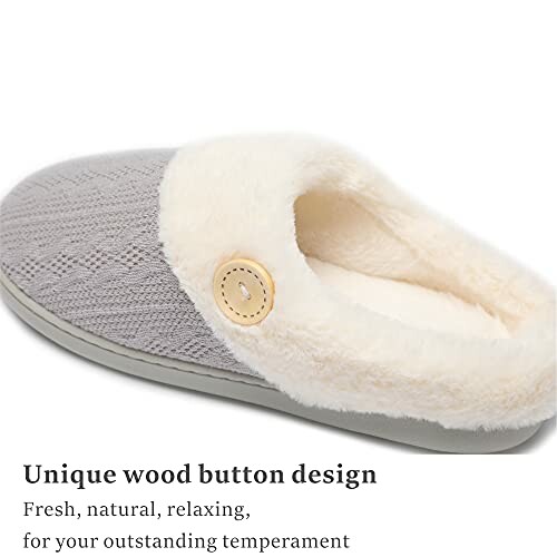 Gray slipper with fuzzy lining and wood button design.