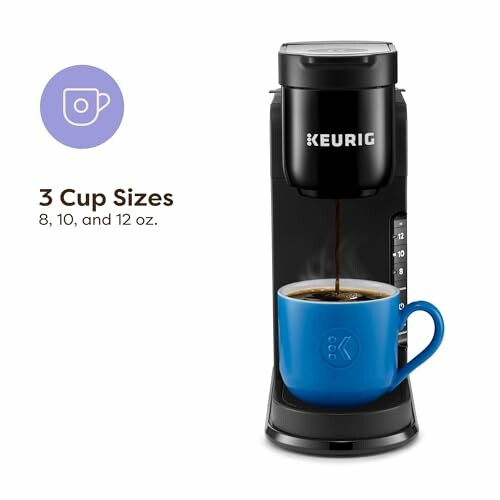 Keurig coffee maker with blue mug and 3 cup sizes.