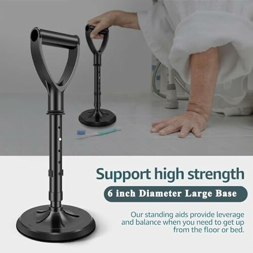 Elderly person using a support handle with a large base for assistance.