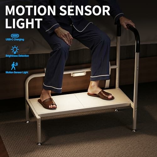Person using a motion sensor light on a bed step with handrail.