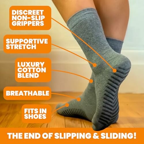 Person wearing gray non-slip socks with features highlighted.
